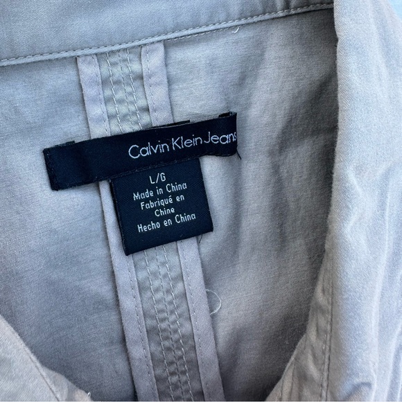 Calvin Klein jeans sleeveless dress with belt size L
Pit to pit: 17”
Length: 37” - Picture 5 of 8